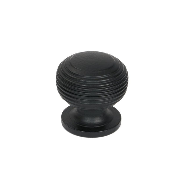 This is an image showing From The Anvil - Matt Black Beehive Cabinet Knob 30mm available from T.H Wiggans Architectural Ironmongery in Kendal, quick delivery and discounted prices