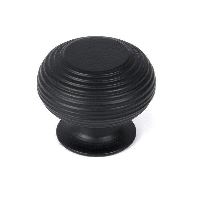 This is an image showing From The Anvil - Matt Black Beehive Cabinet Knob 40mm available from T.H Wiggans Architectural Ironmongery in Kendal, quick delivery and discounted prices