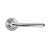 This is an image showing From The Anvil - Polished Marine SS (316) Newbury Lever on Rose Set (Beehive) available from trade door handles, quick delivery and discounted prices