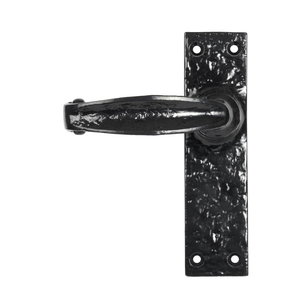 This is an image showing From The Anvil - Black Lever Latch Set available from trade door handles, quick delivery and discounted prices