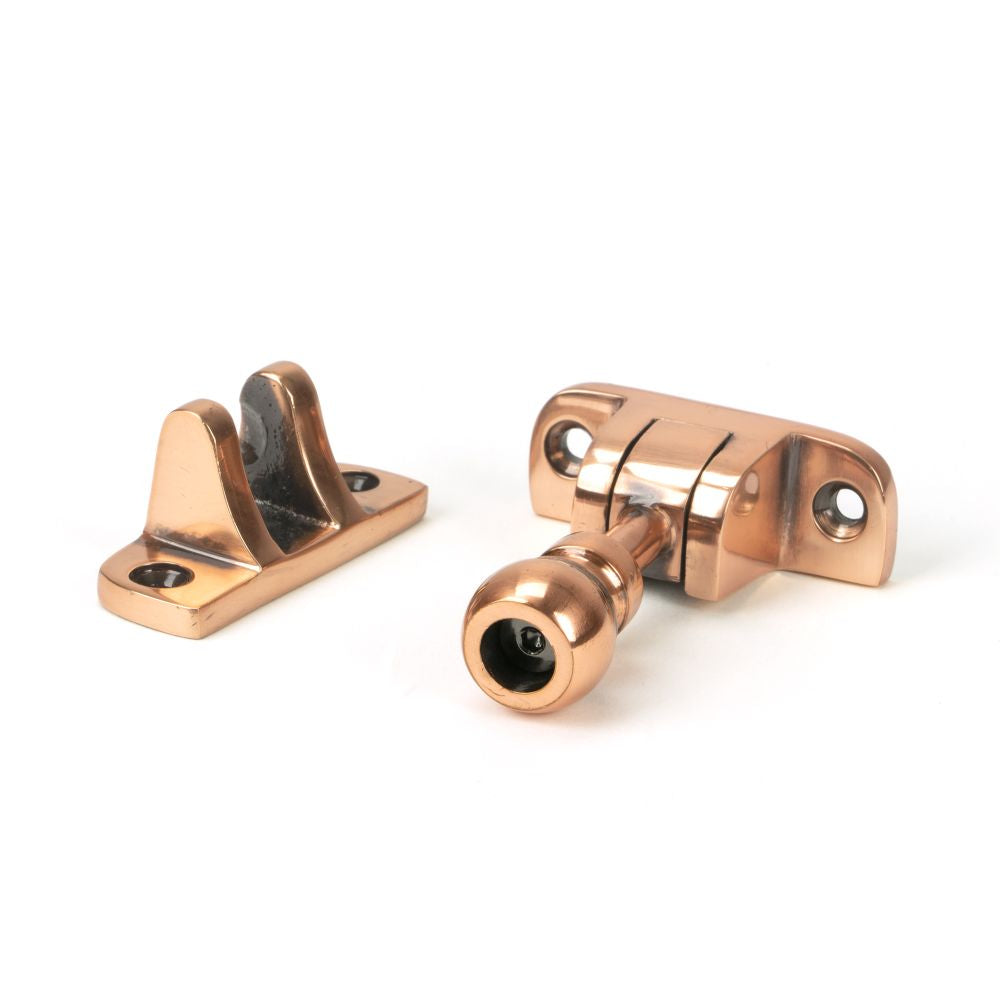 This is an image showing From The Anvil - Polished Bronze Mushroom Brighton Fastener (Radiused) available from T.H Wiggans Architectural Ironmongery in Kendal, quick delivery and discounted prices