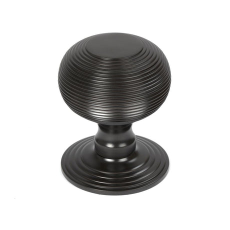 This is an image of From The Anvil - Aged Bronze Beehive Centre Door Knob available to order from T.H Wiggans Architectural Ironmongery in Kendal, quick delivery and discounted prices.