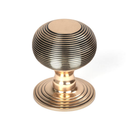 This is an image of From The Anvil - Polished Bronze Beehive Centre Door Knob available to order from T.H Wiggans Architectural Ironmongery in Kendal, quick delivery and discounted prices.