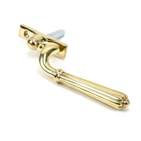 This is an image showing From The Anvil - Polished Brass Hinton Espag - LH available from T.H Wiggans Architectural Ironmongery in Kendal, quick delivery and discounted prices