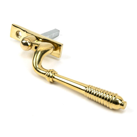 This is an image showing From The Anvil - Polished Brass Reeded Espag - LH available from T.H Wiggans Architectural Ironmongery in Kendal, quick delivery and discounted prices