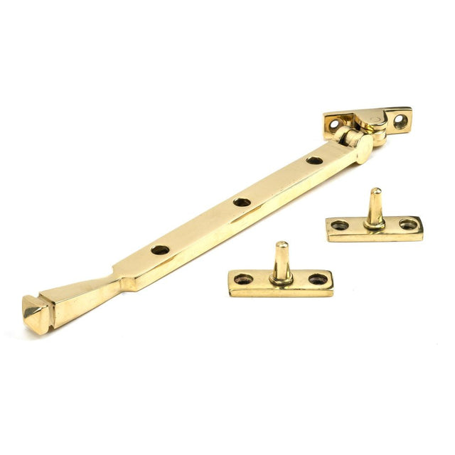 This is an image showing From The Anvil - Polished Brass 10" Avon Stay available from T.H Wiggans Architectural Ironmongery in Kendal, quick delivery and discounted prices