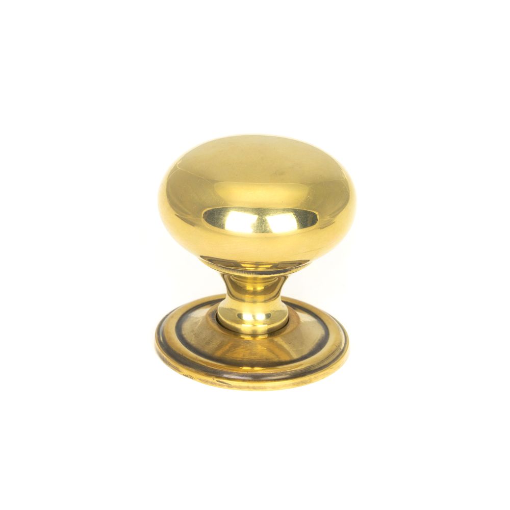 This is an image showing From The Anvil - Aged Brass Mushroom Cabinet Knob 38mm available from T.H Wiggans Architectural Ironmongery in Kendal, quick delivery and discounted prices