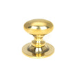 This is an image showing From The Anvil - Aged Brass Oval Cabinet Knob 40mm available from T.H Wiggans Architectural Ironmongery in Kendal, quick delivery and discounted prices