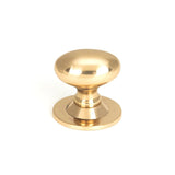 This is an image showing From The Anvil - Polished Bronze Oval Cabinet Knob 40mm available from T.H Wiggans Architectural Ironmongery in Kendal, quick delivery and discounted prices