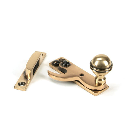 This is an image showing From The Anvil - Polished Bronze Prestbury Sash Hook Fastener available from T.H Wiggans Architectural Ironmongery in Kendal, quick delivery and discounted prices