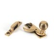 This is an image showing From The Anvil - Polished Bronze Beehive Sash Hook Fastener available from T.H Wiggans Architectural Ironmongery in Kendal, quick delivery and discounted prices