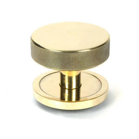 This is an image of From The Anvil - Aged Brass Brompton Centre Door Knob (Plain) available to order from T.H Wiggans Architectural Ironmongery in Kendal, quick delivery and discounted prices.