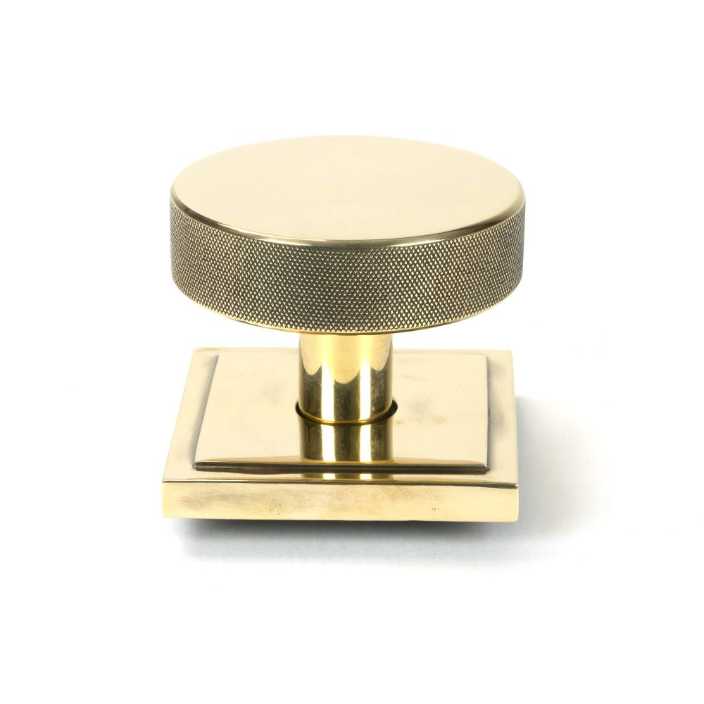 This is an image of From The Anvil - Aged Brass Brompton Centre Door Knob (Square) available to order from T.H Wiggans Architectural Ironmongery in Kendal, quick delivery and discounted prices.