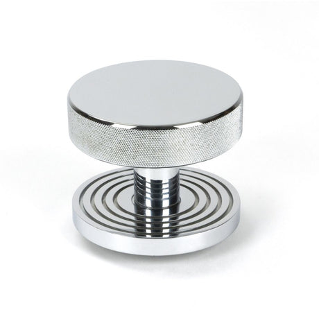 This is an image of From The Anvil - Polished Chrome Brompton Centre Door Knob (Beehive) available to order from T.H Wiggans Architectural Ironmongery in Kendal, quick delivery and discounted prices.