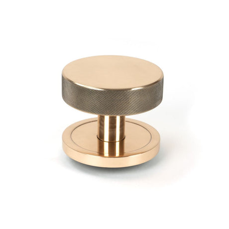 This is an image of From The Anvil - Polished Bronze Brompton Centre Door Knob (Plain) available to order from T.H Wiggans Architectural Ironmongery in Kendal, quick delivery and discounted prices.