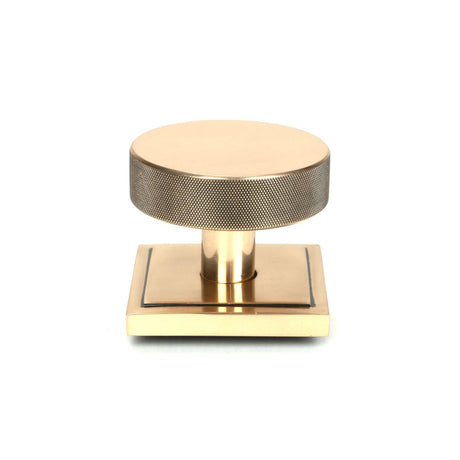 This is an image of From The Anvil - Polished Bronze Brompton Centre Door Knob (Square) available to order from T.H Wiggans Architectural Ironmongery in Kendal, quick delivery and discounted prices.