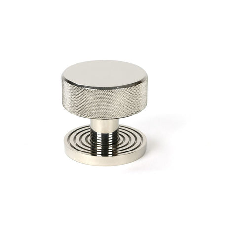 This is an image showing From The Anvil - Polished Nickel Brompton Mortice/Rim Knob Set (Beehive) available from trade door handles, quick delivery and discounted prices