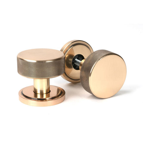 This is an image of From The Anvil - Polished Bronze Brompton Mortice/Rim Knob Set (Art Deco) available to order from T.H Wiggans Architectural Ironmongery in Kendal, quick delivery and discounted prices.