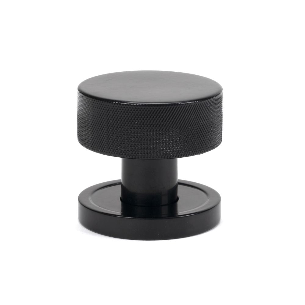 This is an image showing From The Anvil - Black Brompton Mortice/Rim Knob Set (Plain) available from trade door handles, quick delivery and discounted prices