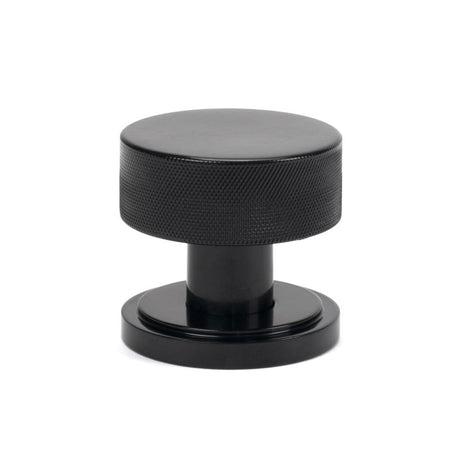 This is an image showing From The Anvil - Black Brompton Mortice/Rim Knob Set (Art Deco) available from trade door handles, quick delivery and discounted prices