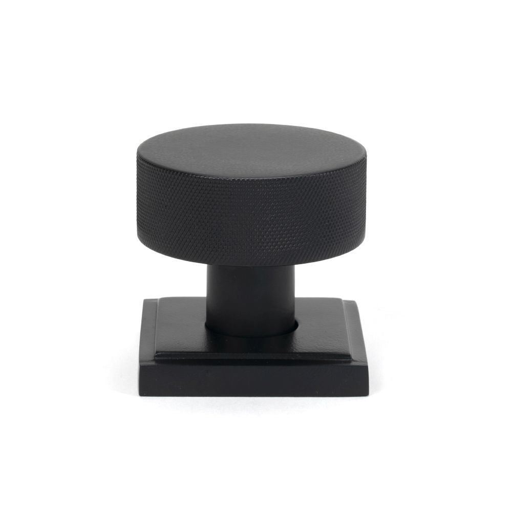 This is an image showing From The Anvil - Matt Black Brompton Mortice/Rim Knob Set (Square) available from trade door handles, quick delivery and discounted prices