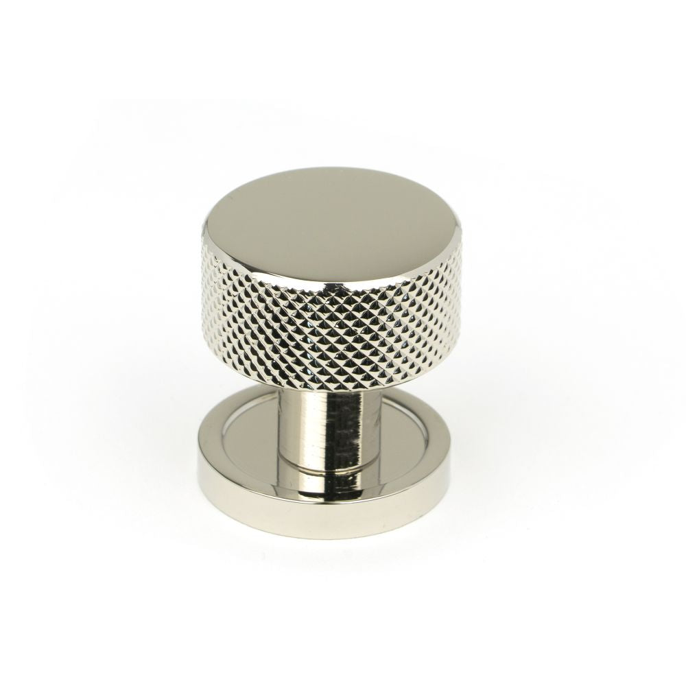 This is an image showing From The Anvil - Polished Nickel Brompton Cabinet Knob - 25mm (Plain) available from T.H Wiggans Architectural Ironmongery in Kendal, quick delivery and discounted prices