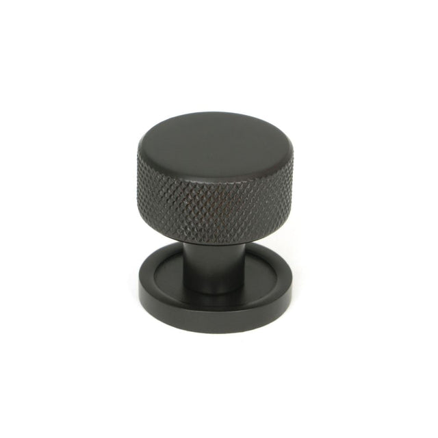 This is an image showing From The Anvil - Aged Bronze Brompton Cabinet Knob - 25mm (Plain) available from T.H Wiggans Architectural Ironmongery in Kendal, quick delivery and discounted prices