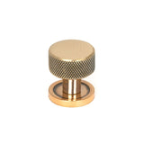 This is an image showing From The Anvil - Polished Bronze Brompton Cabinet Knob - 25mm (Plain) available from T.H Wiggans Architectural Ironmongery in Kendal, quick delivery and discounted prices