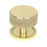 This is an image showing From The Anvil - Polished Brass Brompton Cabinet Knob - 38mm (Plain) available from T.H Wiggans Architectural Ironmongery in Kendal, quick delivery and discounted prices