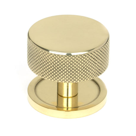 This is an image showing From The Anvil - Polished Brass Brompton Cabinet Knob - 38mm (Plain) available from T.H Wiggans Architectural Ironmongery in Kendal, quick delivery and discounted prices