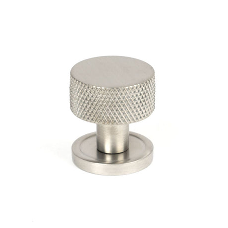 This is an image showing From The Anvil - Satin SS (304) Brompton Cabinet Knob - 25mm (Plain) available from T.H Wiggans Architectural Ironmongery in Kendal, quick delivery and discounted prices