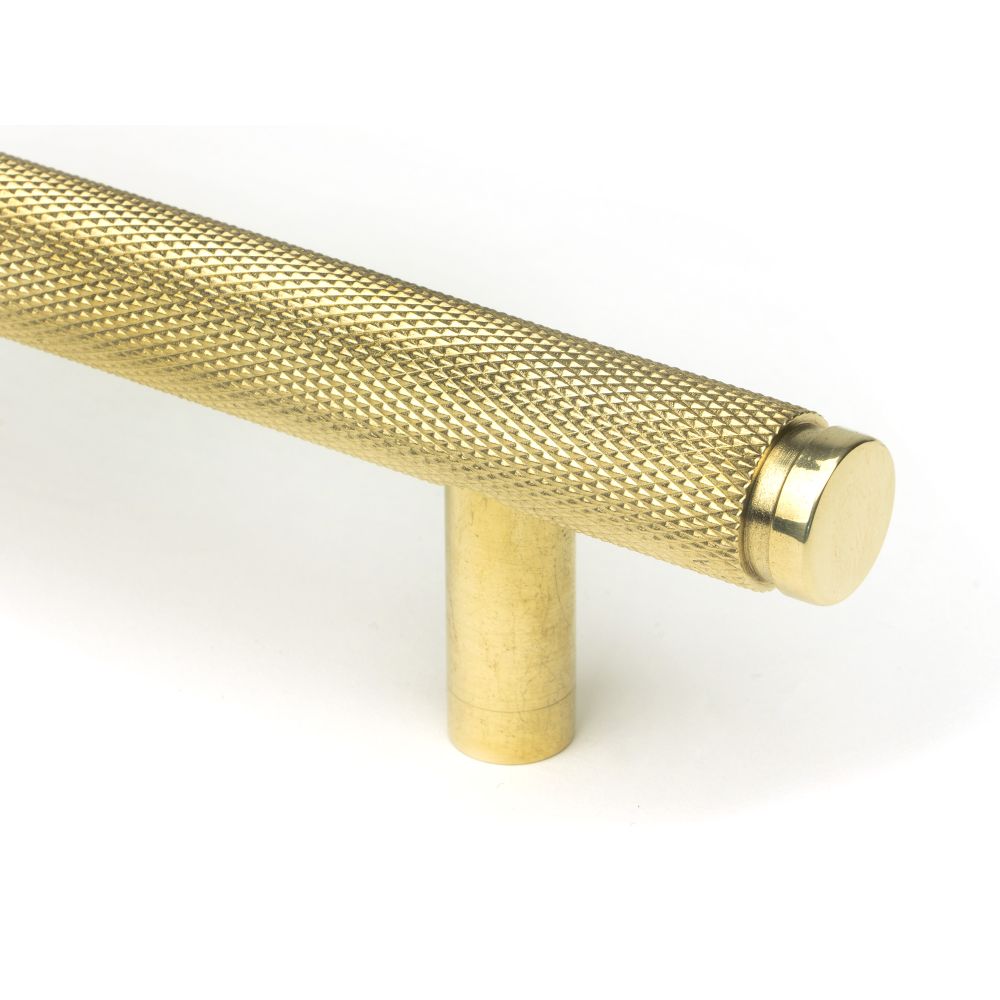 This is an image showing From The Anvil - Polished Brass Full Brompton Pull Handle - Small available from trade door handles, quick delivery and discounted prices