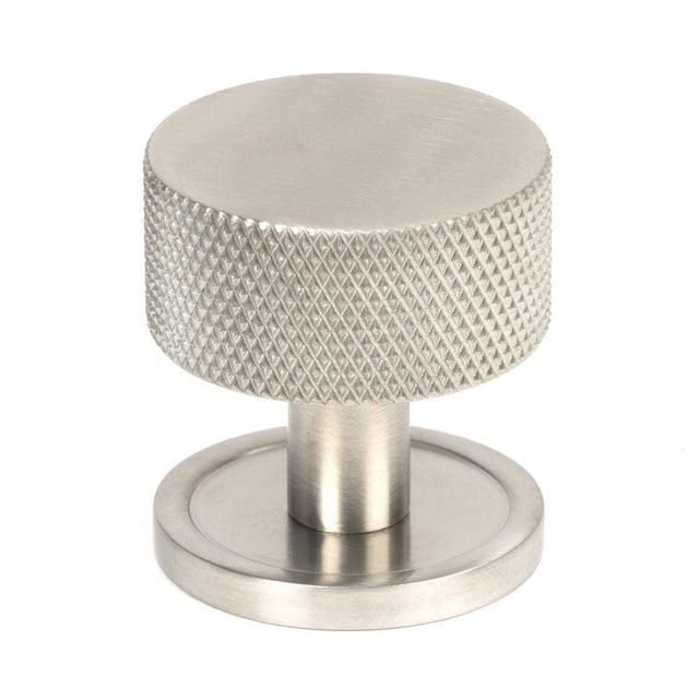 This is an image showing From The Anvil - Satin SS (304) Brompton Cabinet Knob - 32mm (Plain) available from T.H Wiggans Architectural Ironmongery in Kendal, quick delivery and discounted prices