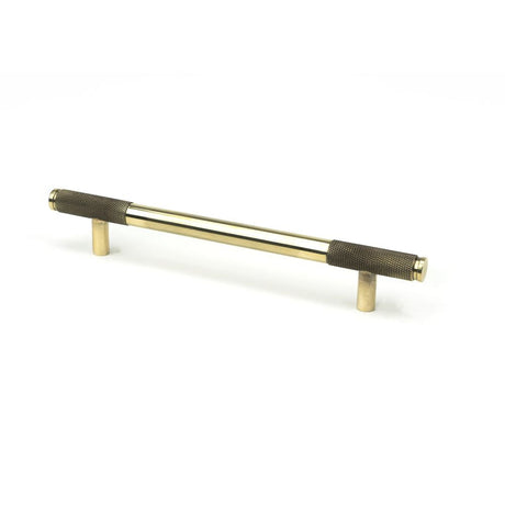This is an image showing From The Anvil - Aged Brass Half Brompton Pull Handle - Medium available from T.H Wiggans Architectural Ironmongery in Kendal, quick delivery and discounted prices