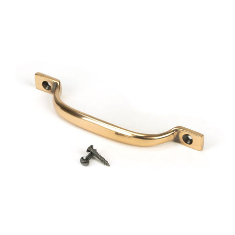 This is an image showing From The Anvil - Polished Bronze Slim Sash Pull available from T.H Wiggans Architectural Ironmongery in Kendal, quick delivery and discounted prices