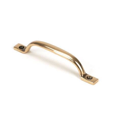 This is an image showing From The Anvil - Polished Bronze Slim Sash Pull available from T.H Wiggans Architectural Ironmongery in Kendal, quick delivery and discounted prices