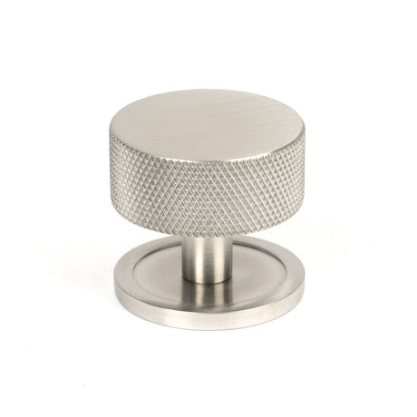 This is an image showing From The Anvil - Satin SS (304) Brompton Cabinet Knob - 38mm (Plain) available from T.H Wiggans Architectural Ironmongery in Kendal, quick delivery and discounted prices