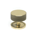 This is an image showing From The Anvil - Aged Brass Brompton Cabinet Knob - 38mm (Plain) available from T.H Wiggans Architectural Ironmongery in Kendal, quick delivery and discounted prices