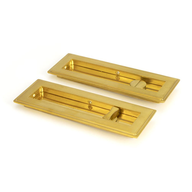 This is an image of From The Anvil - Polished Brass 175mm Art Deco Rectangular Pull - Privacy Set available to order from T.H Wiggans Architectural Ironmongery in Kendal, quick delivery and discounted prices.