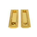 This is an image showing From The Anvil - Polished Brass 250mm Art Deco Rectangular Pull - Privacy Set available from trade door handles, quick delivery and discounted prices