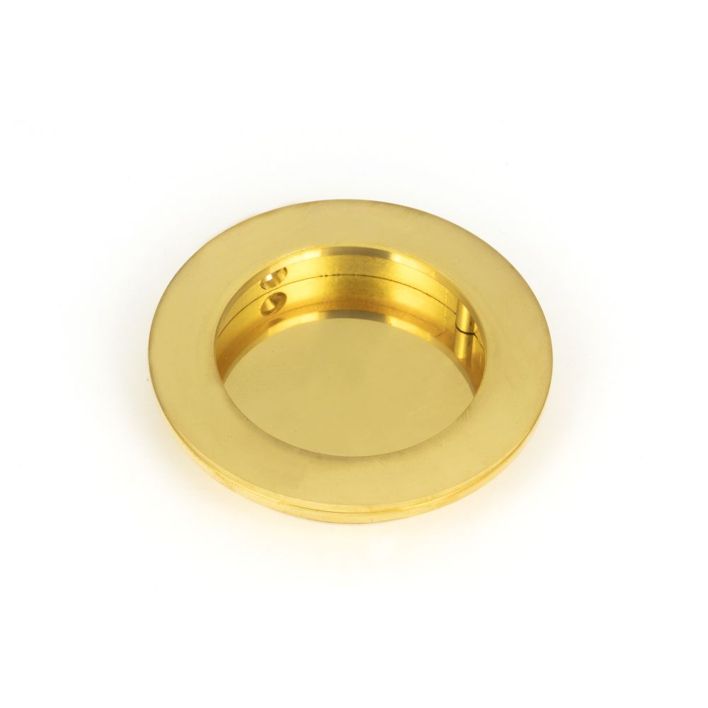 This is an image of From The Anvil - Polished Brass 75mm Plain Round Pull available to order from T.H Wiggans Architectural Ironmongery in Kendal, quick delivery and discounted prices.