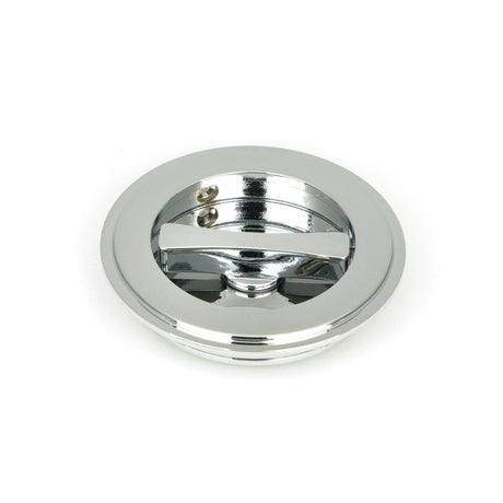 This is an image showing From The Anvil - Polished Chrome 75mm Art Deco Round Pull - Privacy Set available from trade door handles, quick delivery and discounted prices