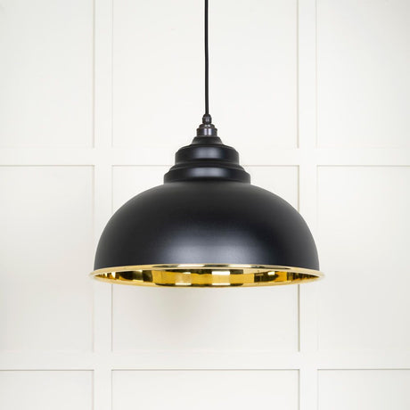 This is an image showing From The Anvil - Smooth Brass Harborne Pendant in Elan Black available from T.H Wiggans Architectural Ironmongery in Kendal, quick delivery and discounted prices