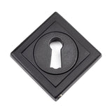 This is an image showing From The Anvil - Matt Black Round Escutcheon (Square) available from trade door handles, quick delivery and discounted prices