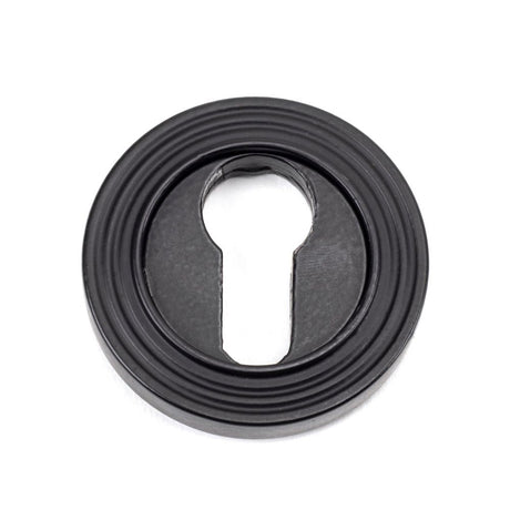 This is an image of From The Anvil - Matt Black Round Euro Escutcheon (Beehive) available to order from T.H Wiggans Architectural Ironmongery in Kendal, quick delivery and discounted prices.