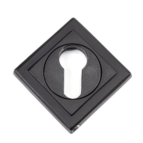 This is an image showing From The Anvil - Matt Black Round Euro Escutcheon (Square) available from trade door handles, quick delivery and discounted prices