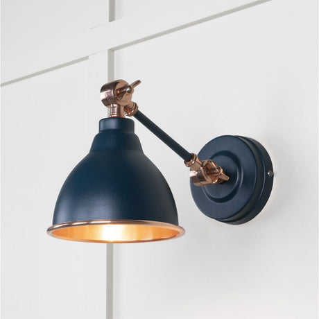 This is an image showing From The Anvil - Smooth Copper Brindley Wall Light in Dusk available from T.H Wiggans Architectural Ironmongery in Kendal, quick delivery and discounted prices