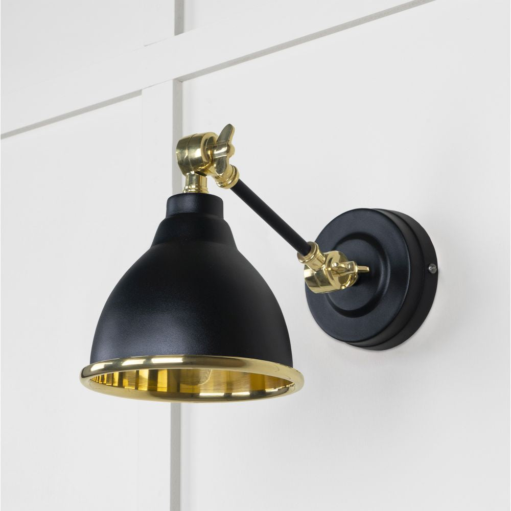 This is an image showing From The Anvil - Smooth Brass Brindley Wall Light in Elan Black available from T.H Wiggans Architectural Ironmongery in Kendal, quick delivery and discounted prices