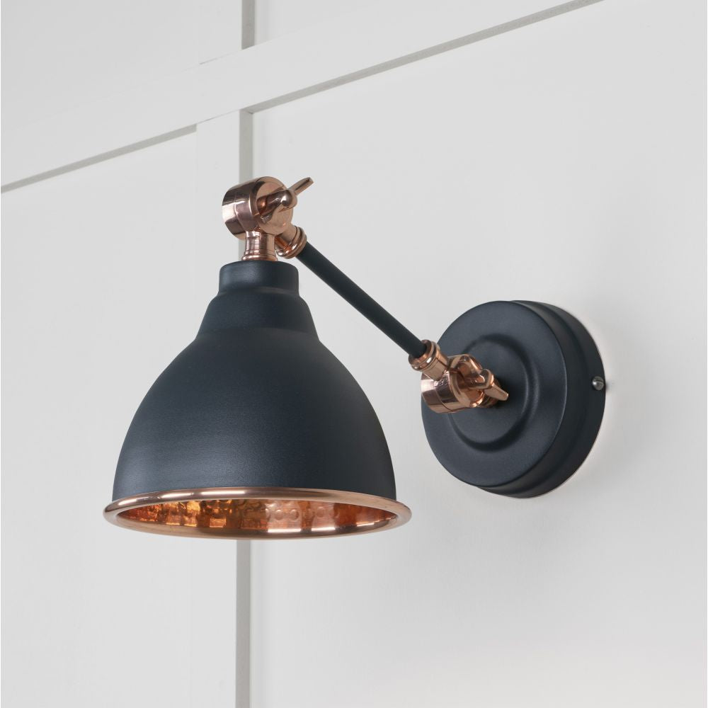 This is an image showing From The Anvil - Hammered Copper Brindley Wall Light in Soot available from T.H Wiggans Architectural Ironmongery in Kendal, quick delivery and discounted prices