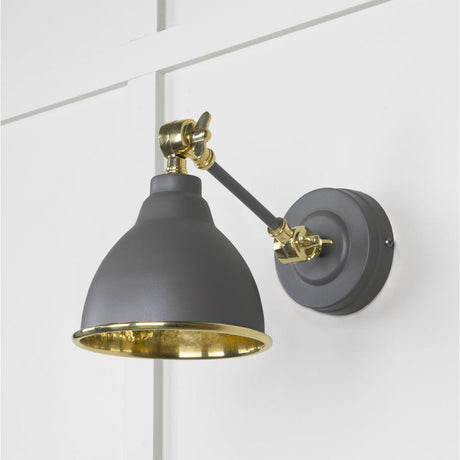 This is an image showing From The Anvil - Hammered Brass Brindley Wall Light in Bluff available from T.H Wiggans Architectural Ironmongery in Kendal, quick delivery and discounted prices